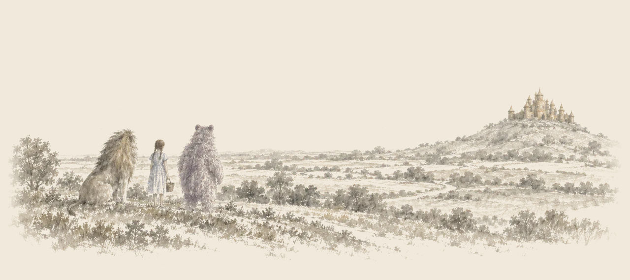 Dorothy, the Cowardly Lion and the Lavender Bear, seen from behind, look across rolling country to a distant hilltop crowned with the Wicker Castle.