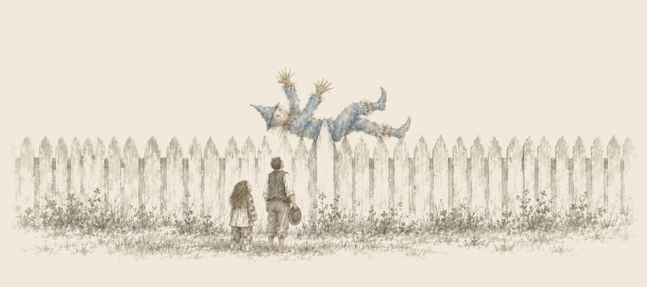 The Scarecrow lies caught on a pointed picket at the top of a tall white fence, arms waving, while the Patchwork Girl and Hip Hopper look up.